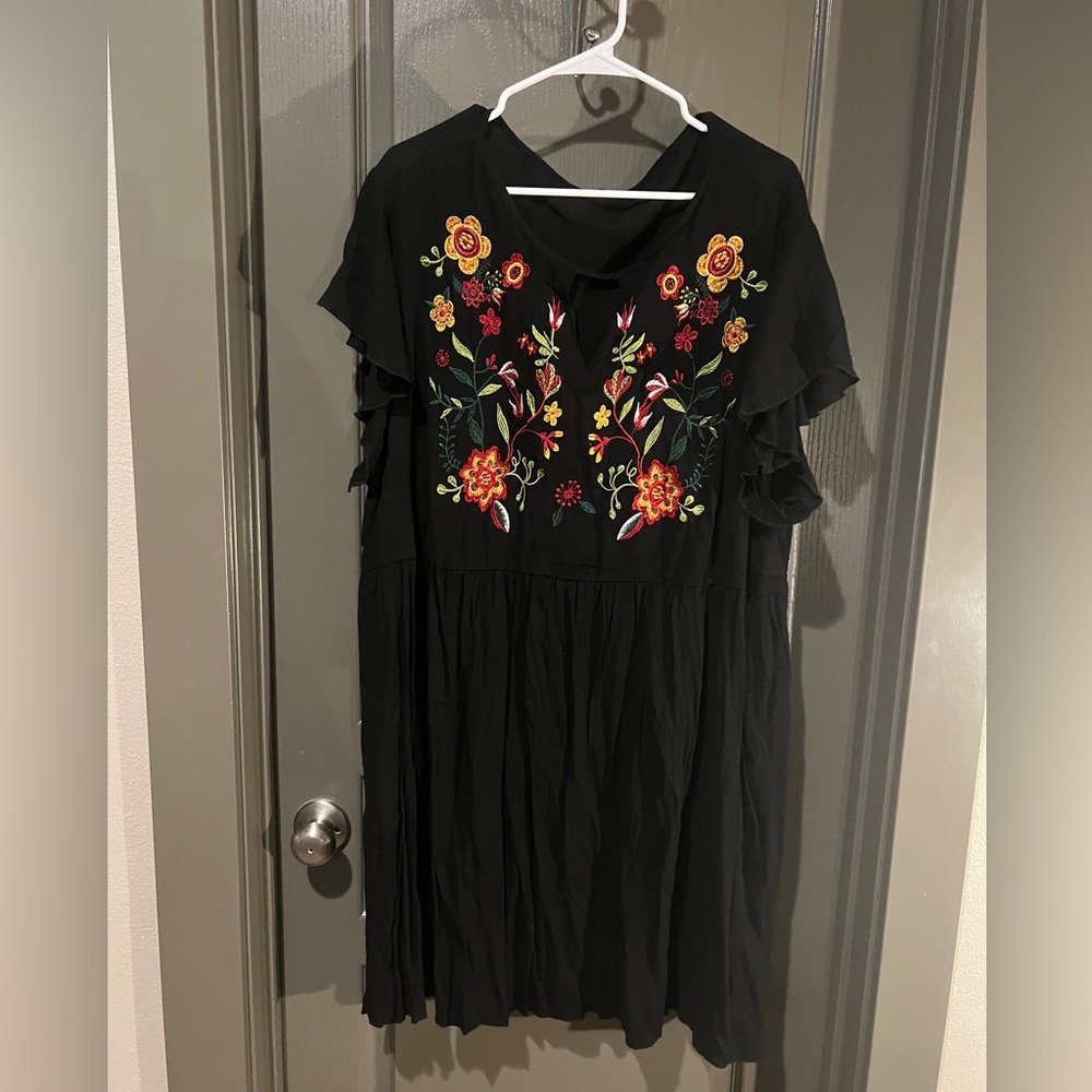 Black dress with flower embroidery detail